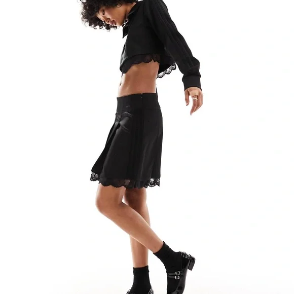 Adidas black varsity skirt with lace trim. Worn once. - Picture 2 of 4